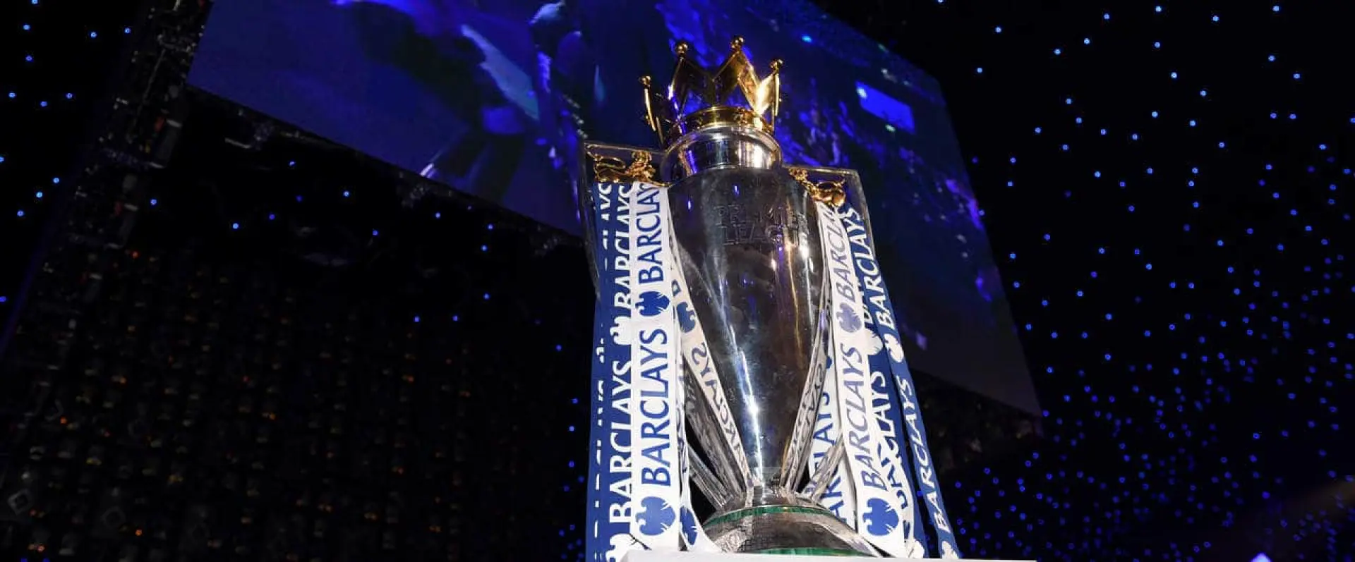 The Barclays Premier League trophy on a plinth on stage